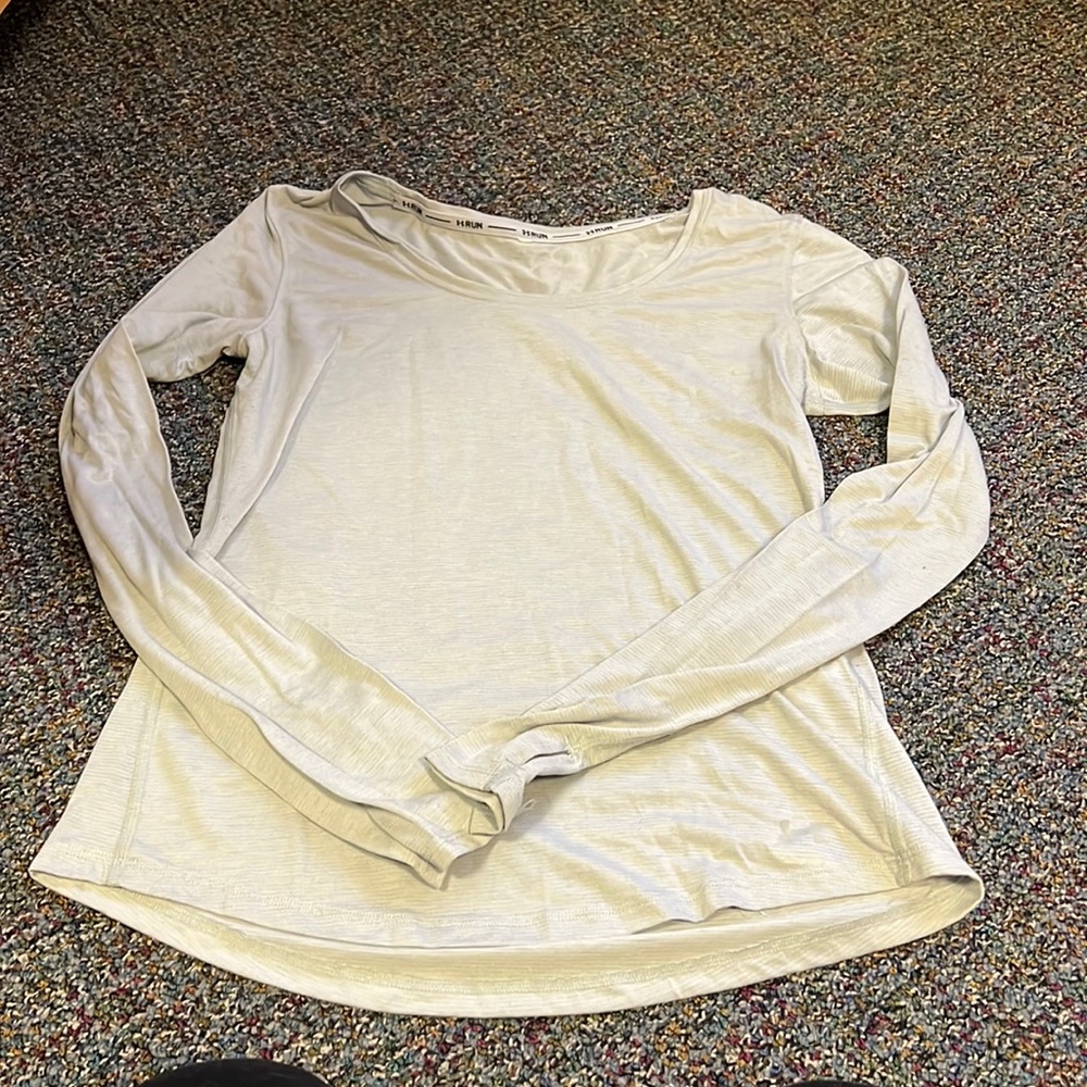 Under Armor grey and white striped running long sleeve tee. Size Medium.